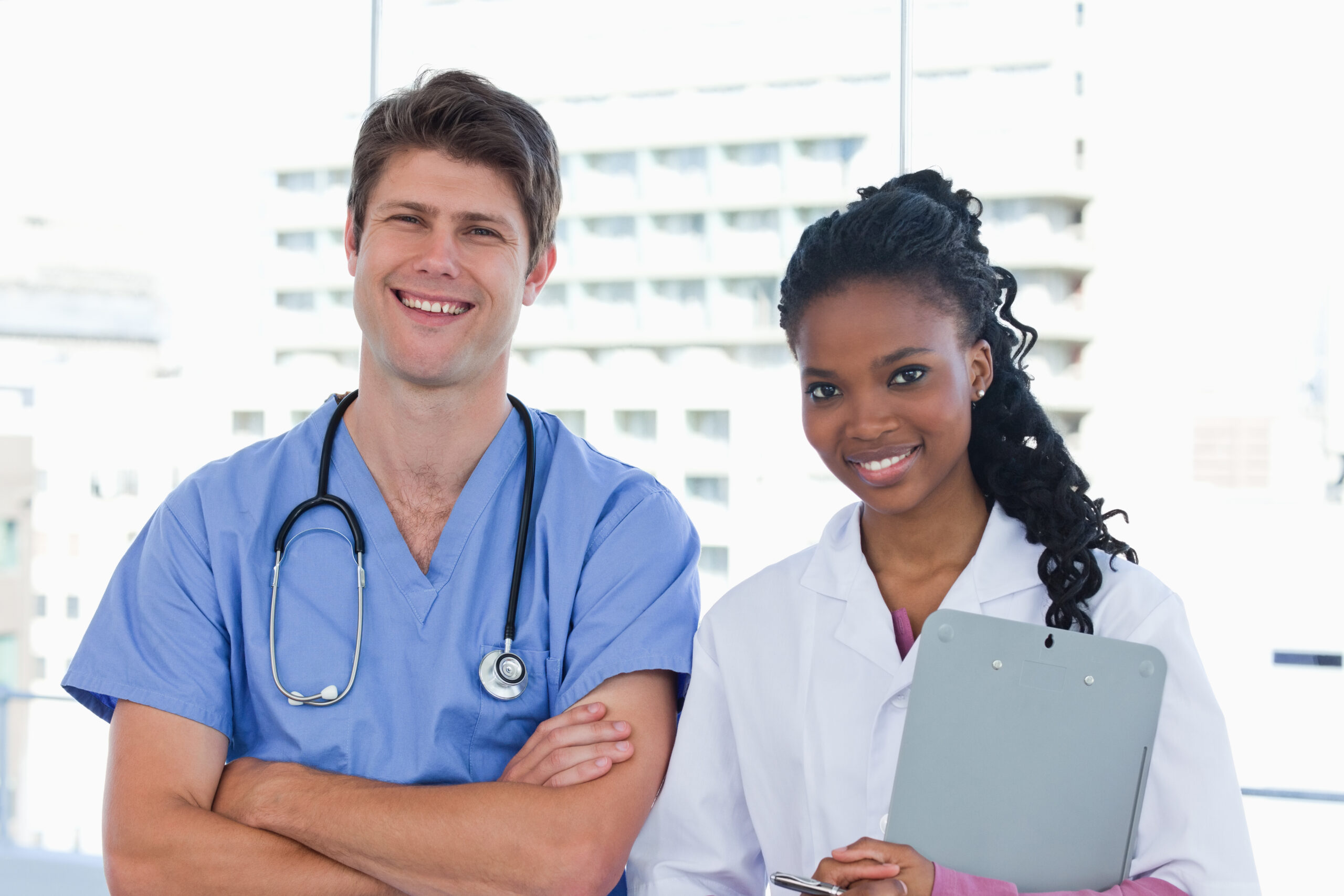 Happy doctors standing up Happy doctors standing up